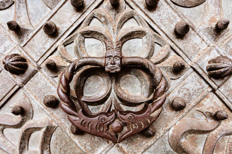 Old style metal door knocker. stock photo