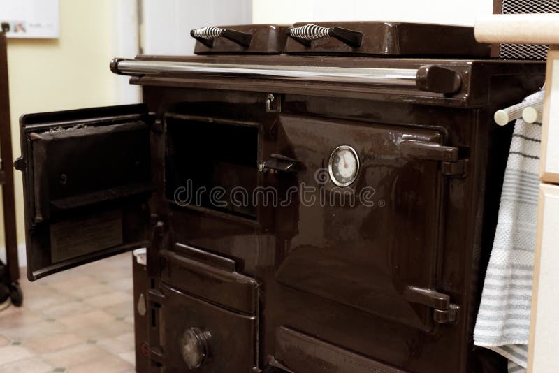 Old Style Oil Burning Stove in Retro Kitchen Interior Stock Image