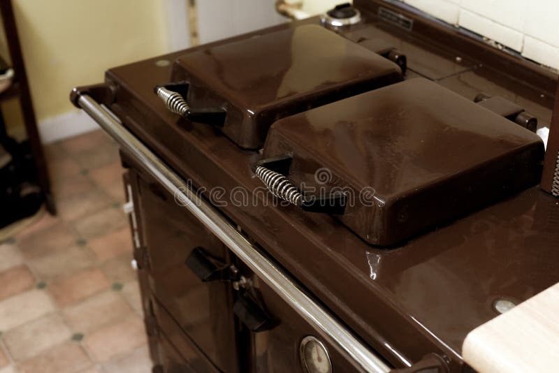 Old Style Oil Burning Stove in Retro Kitchen Interior Stock Image