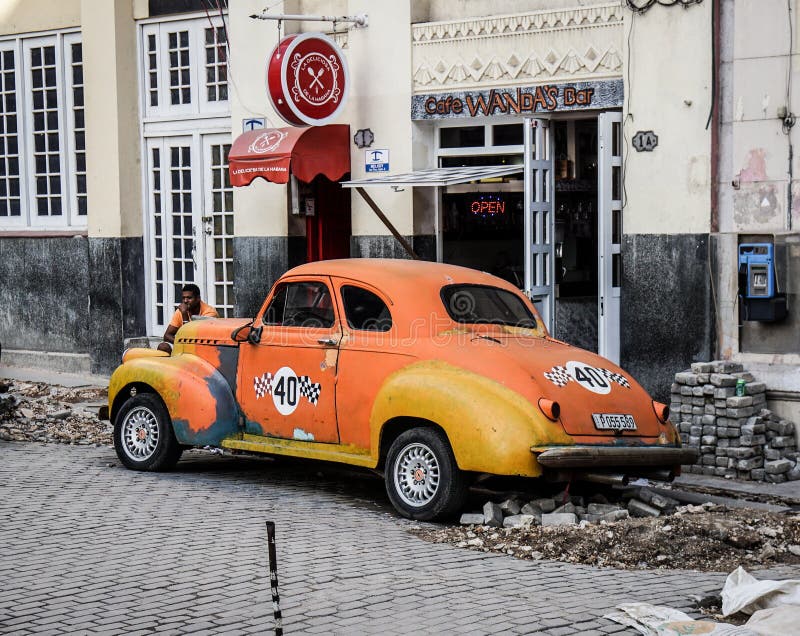 Old Taxi in broken street, Havana, Cuba stock image Old Taxi in broken street, Havana, Cuba stock image