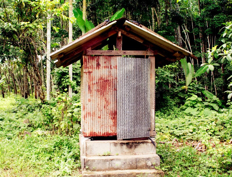 Old toilet in garden in Thailand