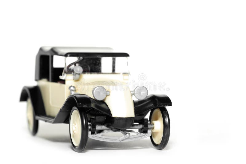Old toy car Tatra 11 Faeton. Picture of a old plastic toy car Tatra 11 Faeton 1924. Czech toy from my brothers toy collection. Made in the 1970's. Isolated on royalty free stock images Old toy car Tatra 11 Faeton. Picture of a old plastic toy car Tatra 11 Faeton 1924. Czech toy from my brothers toy collection. Made in the 1970's. Isolated on royalty free stock images