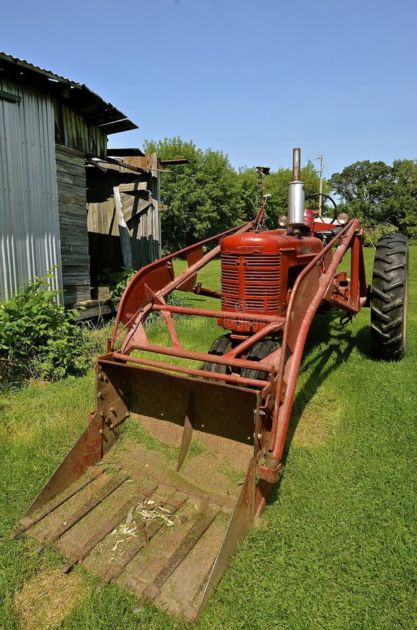 Old Tractor with Front End Loader Stock Photo Image of loader, garage
