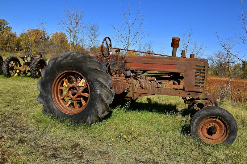 Old Rusty Abandoned Tractor Left in a Junkyard Stock Photo Image of