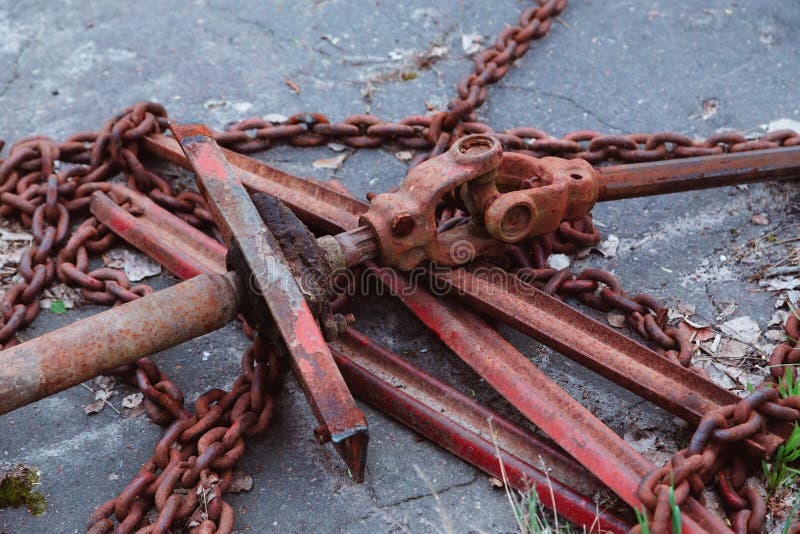 Old Tractors and Other Farm Material on a Scrap Yard Stock Photo