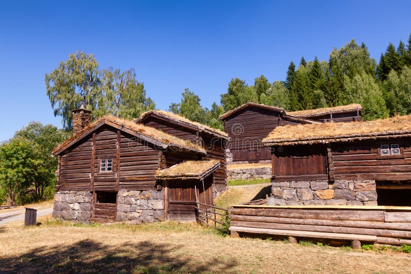 Old traditional Norwegian sod roof log houses at Maihaugen Folks museum Lillehammer Oppland Norway Scandinavia