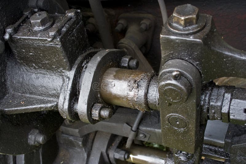 Closeup view of the engine of an old train. Closeup view of the engine of an old train.