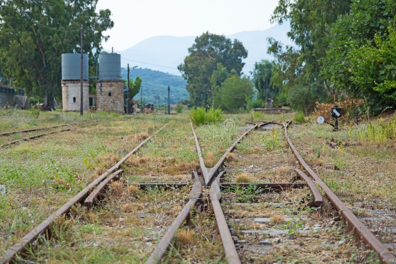 Old train tracks at an old railway station, Greece.