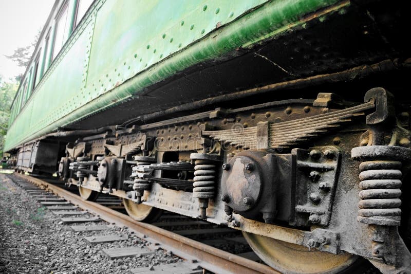 Detail shot with wheels and suspension system from an old train wagon