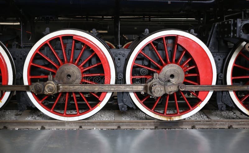 View of old train wheel with railway.