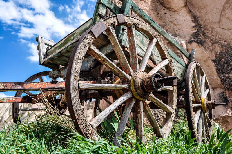 An old abandoned wagon in the hills of Cappadocia in Turkey. An old abandoned wagon in the hills of Cappadocia in Turkey