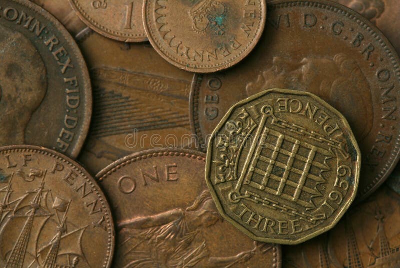 Old coins of the United Kingdom Texture. Old coins of the United Kingdom Texture