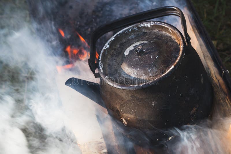 Old Used Black Teapot with Boiling Water Stock Photo Image of outdoor