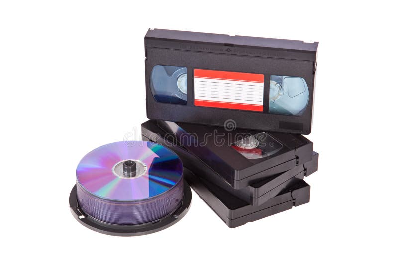 Old Video Cassette Tapes With A DVD Disc Isolated Stock 