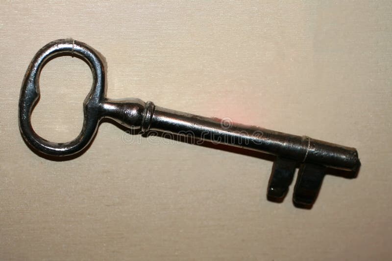 Old Vintage Key. Rare Big Key on a Gray Background. Stock Image Image