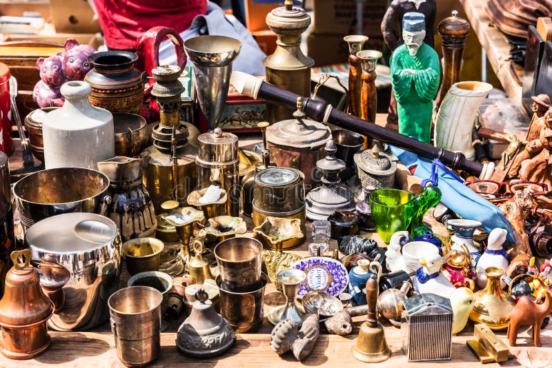 Old vintage objects and furniture at a garage sale at the flea m