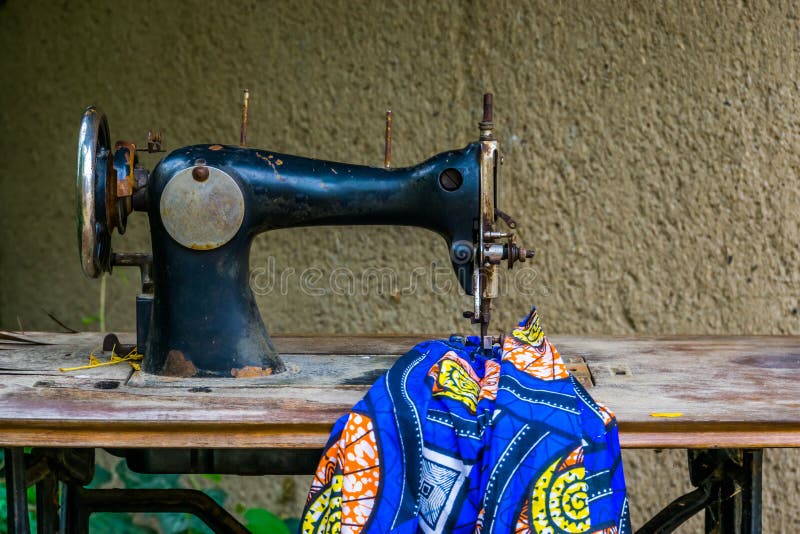 Old Vintage Sewing Machine with a Fabric, Nostalgic Equipment