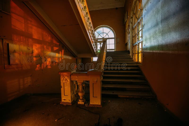 Old vintage staircase at the old abandoned building