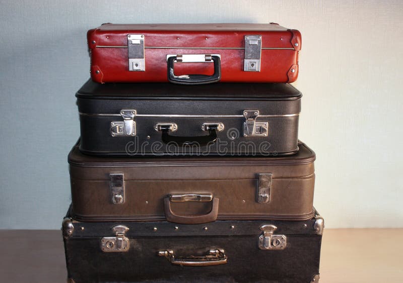 Old Vintage Suitcases are Stacked Against the Wall. Four Suitcases Stock Image Image of ticket
