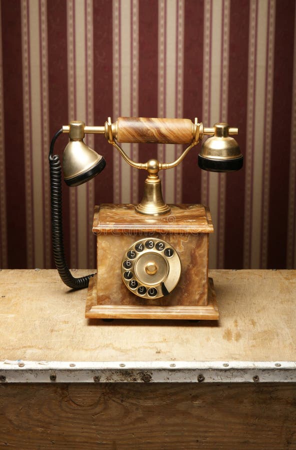An Old Vintage Telephone on a Wooden Table Stock Photo Image of