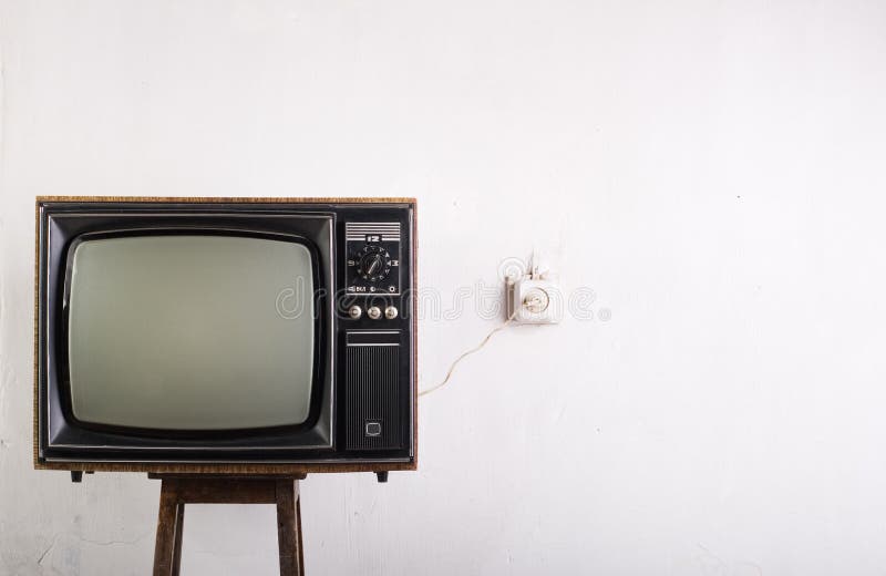 Old vintage TV over a white background