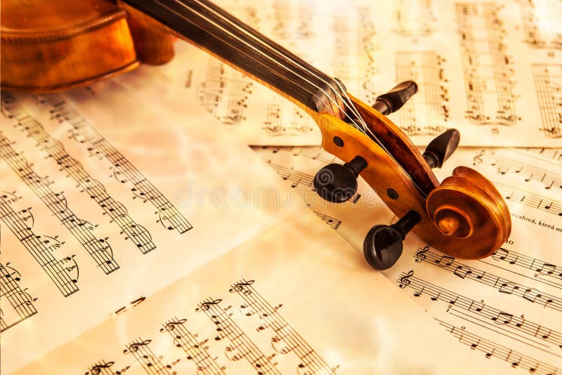old violin lying on the sheet of music stock image image of old violin sheet music