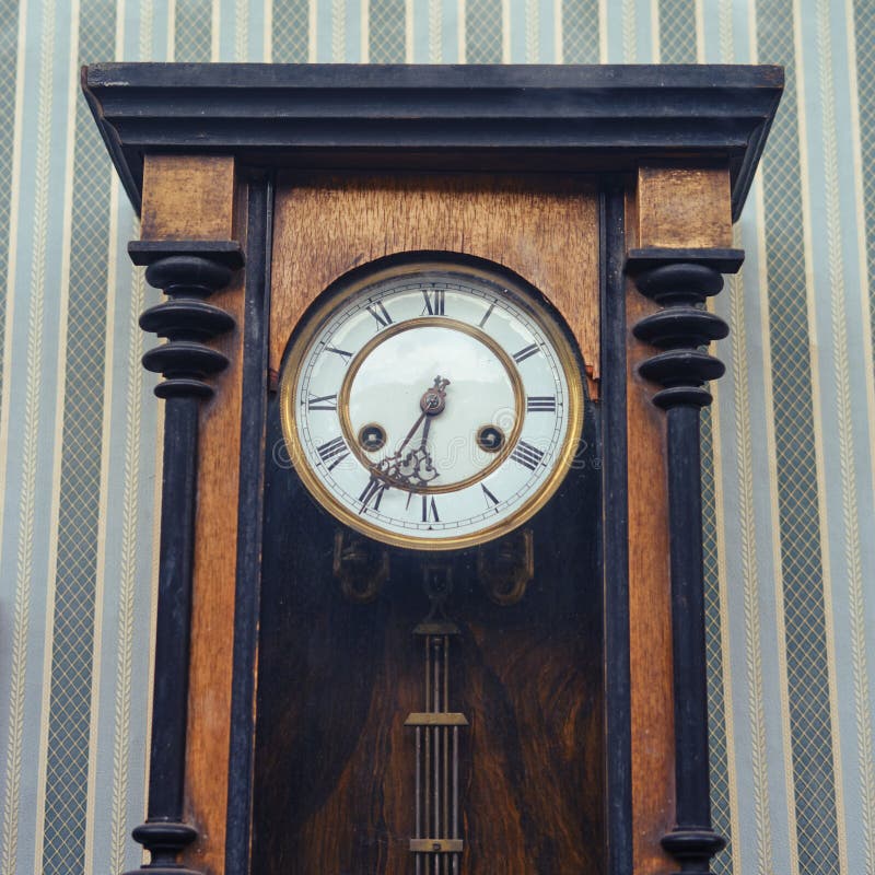 Old Wall Clock on the Wall with Wallpaper, Close Up Stock Image Image