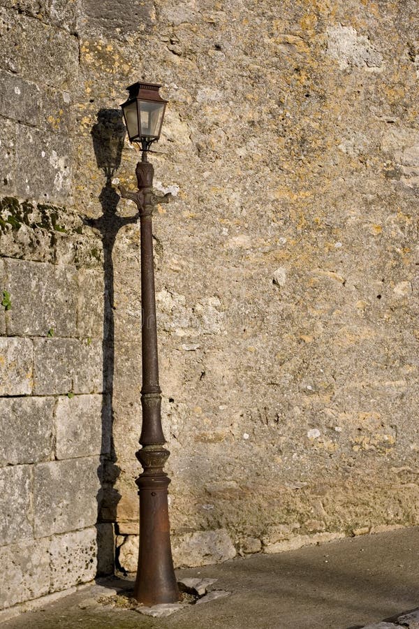 Old Wall with Lamp Post stock photo. Image of rampart 2169344