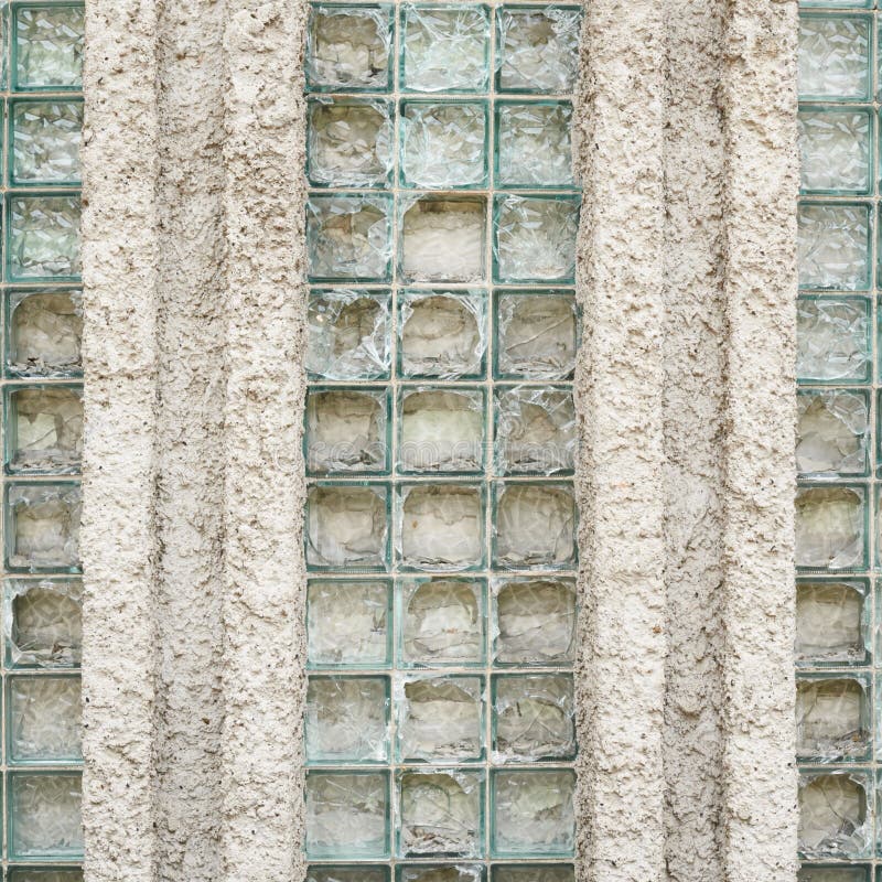 Old wall made of broken glass bricks, abstract background texture fragment. Concrete fragment stock images, royalty-free photos and pictures