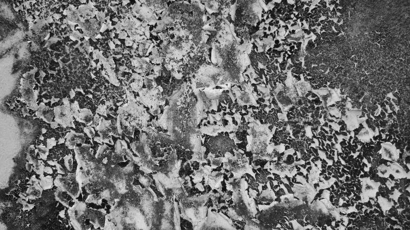 Old wall texture with grayscale soft colour background. The background of the wall paint on the walls of the house which is affected by weather conditions, causing damage and peeling of the beautiful wall paint texture. Retro grayscale paint stock images, royalty-free photos and pictures