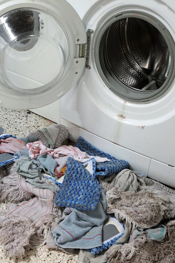 Old Washing Machine and Many Rags Stock Photo Image of concept