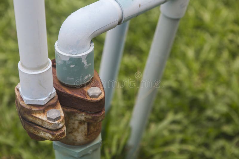 Old water pipe in garden stock image. Image of clean 118976051