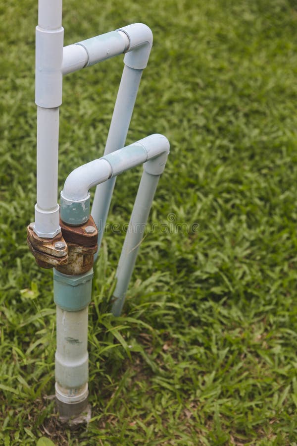 Old water pipe in garden stock image. Image of clean 118976051