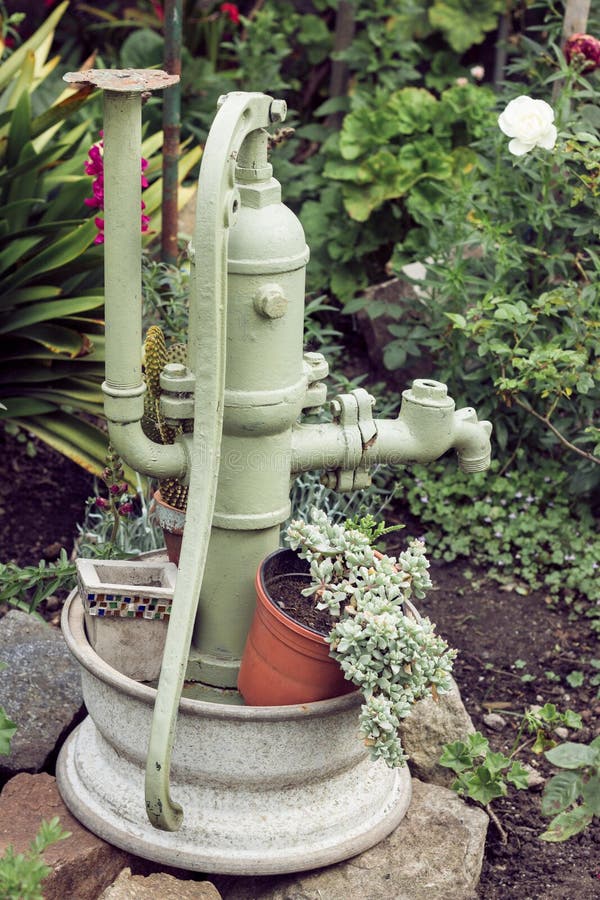Old water pump stock image. Image of manual, hand, green 49525821