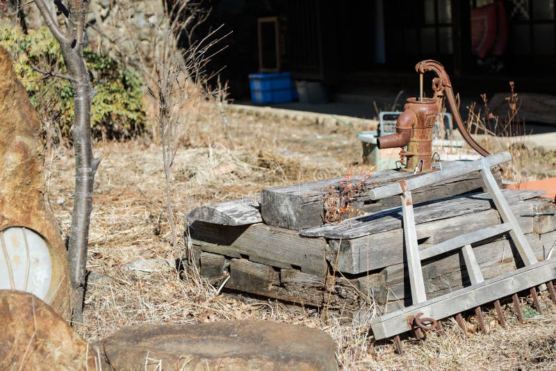 Old water pump stock photo. Image of object, pump, traditional 109794644