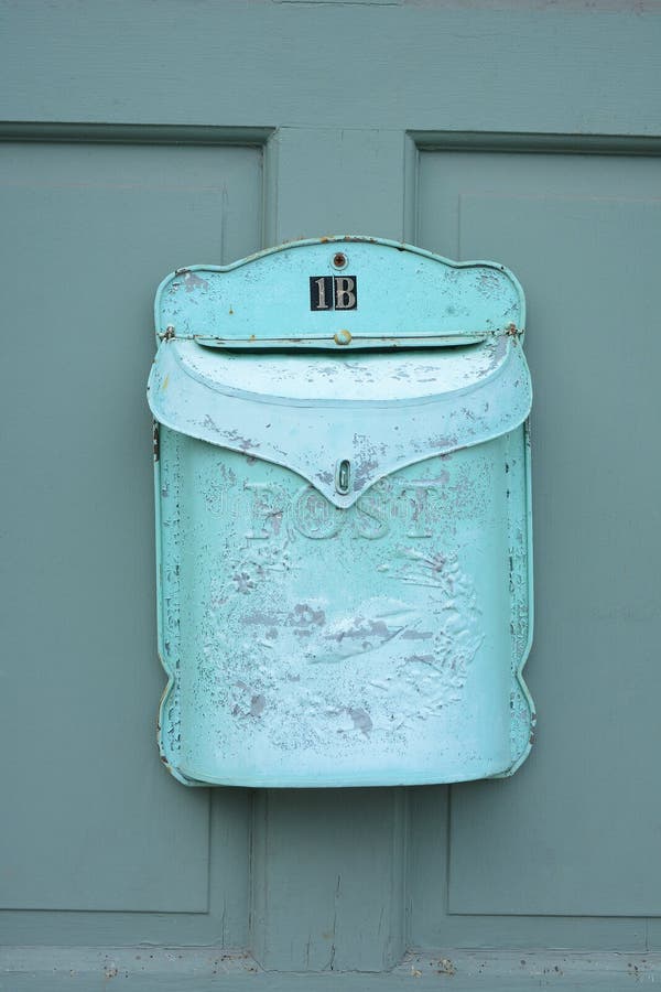 An old weathered mail box