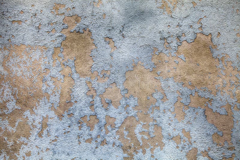 Old weathered paint layer on old concrete wall.