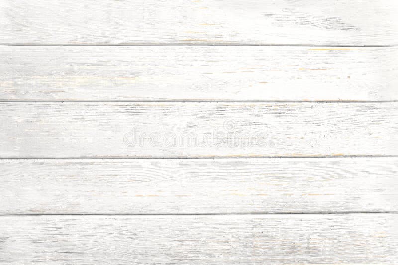 Old weathered wooden plank painted in white color