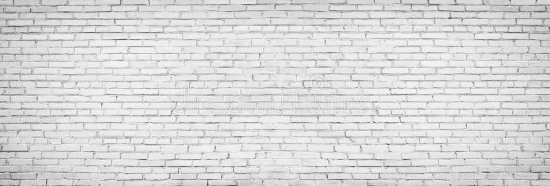 Old white brick wall background, vintage texture of light brickwork