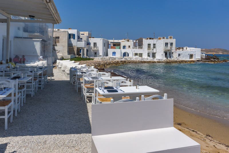 Old white house and Bay in Naoussa town, Paros island, Greece royalty free stock photography Old white house and Bay in Naoussa town, Paros island, Greece royalty free stock photography