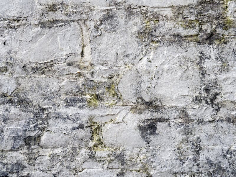 Old white, painted stone wall background. royalty free stock photography
