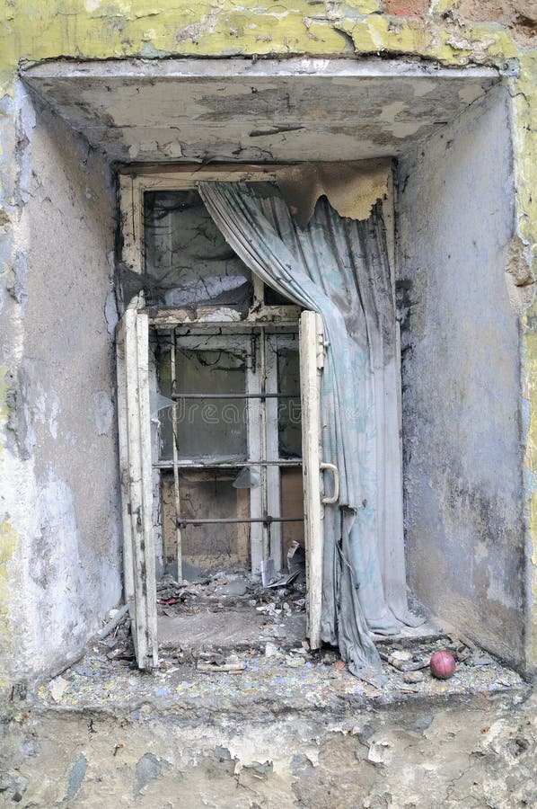 Old window in broken house