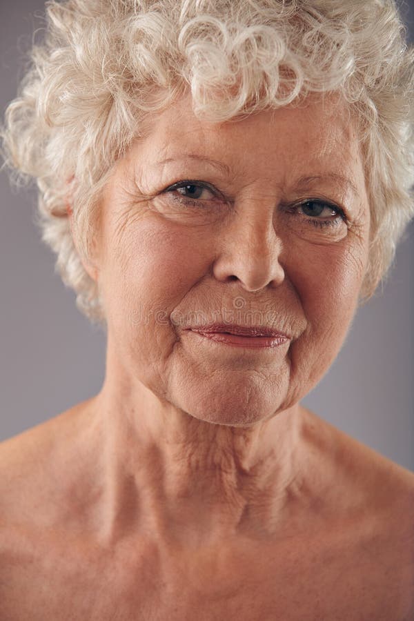 Close up on faces of older women stock photos