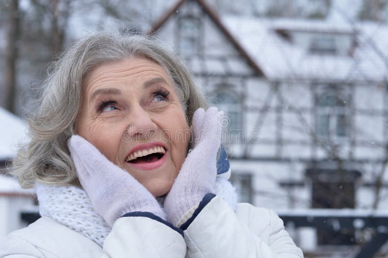 Old Woman in a Fur Coat in the Winter Stock Photo Image of person