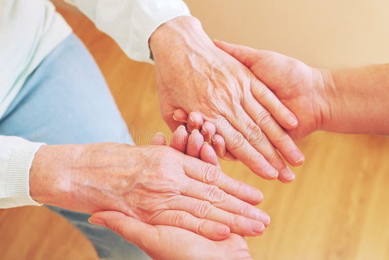 Close Up Of Senior Woman And Young Woman Holding Hands. Care And - 800x533 - jpeg Holding Hands Care