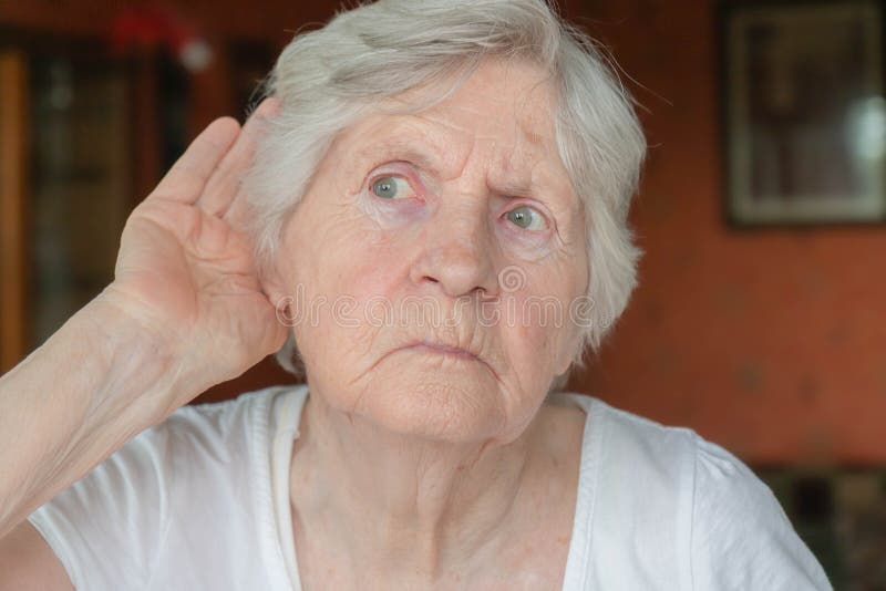 old-woman-having-difficulty-hearing-senior-holding-hand-to-ear-lady-problems-portrait-grandmother-trying-hear-something-195688583.jpg