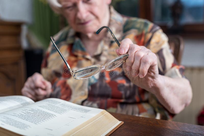 Old Woman Holding Her Glasses Stock Image Image of elder, person