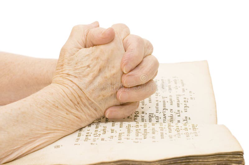 The old woman reads the bible