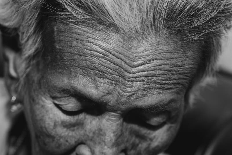 The old woman`s felling lonely. ,she`s senior woman in family and the elderly. royalty free stock images The old woman`s felling lonely. ,she`s senior woman in family and the elderly. royalty free stock images