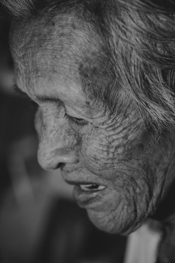 The old woman`s felling lonely. ,she`s senior woman in family and the elderly. stock photography The old woman`s felling lonely. ,she`s senior woman in family and the elderly. stock photography